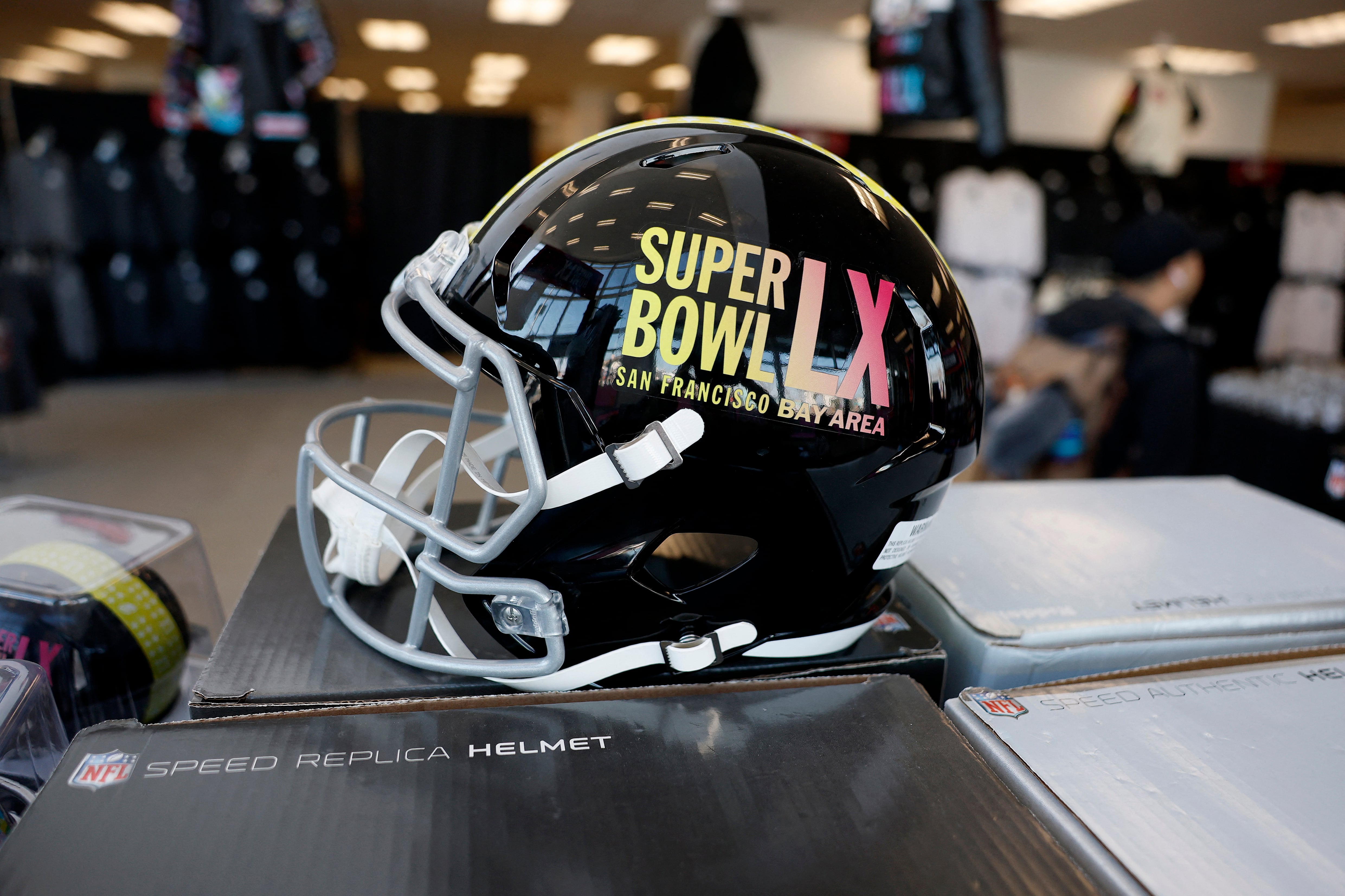 SAN FRANCISCO, CALIFORNIA - FEBRUARY 03: A Super Bowl LX helmet is displayed at an official NFL pop-up Super Bowl shop on February 03, 2026 in San Francisco, California. More than 1.3 million visitors are expected to descend on San Francisco and San Jose during Super Bowl week ahead of Sunday’s matchup between the New England Patriots and the Seattle Seahawks at Levi’s Stadium in Santa Clara. Justin Sullivan/Getty Images/AFP (Photo by JUSTIN SULLIVAN / GETTY IMAGES NORTH AMERICA / Getty Images via AFP)