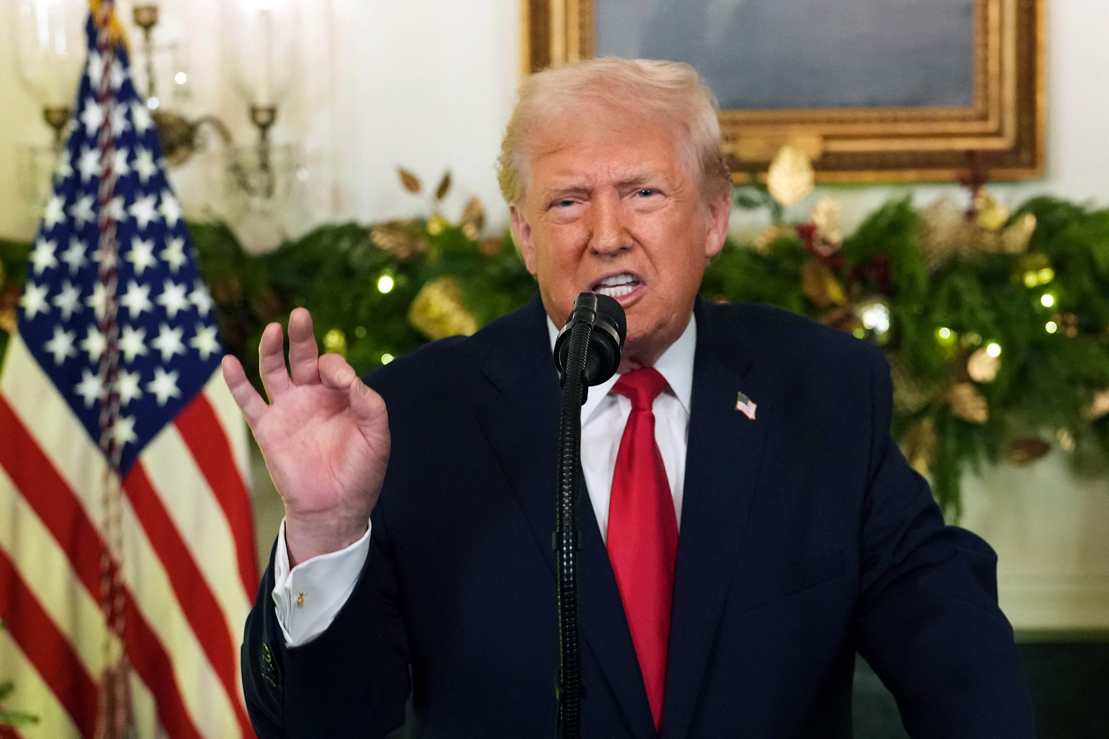 US President Donald Trump addresses the nation from the Diplomatic Reception Room of the White House in Washington, DC, on December 17, 2025. (Photo by Doug MILLS / POOL / AFP)