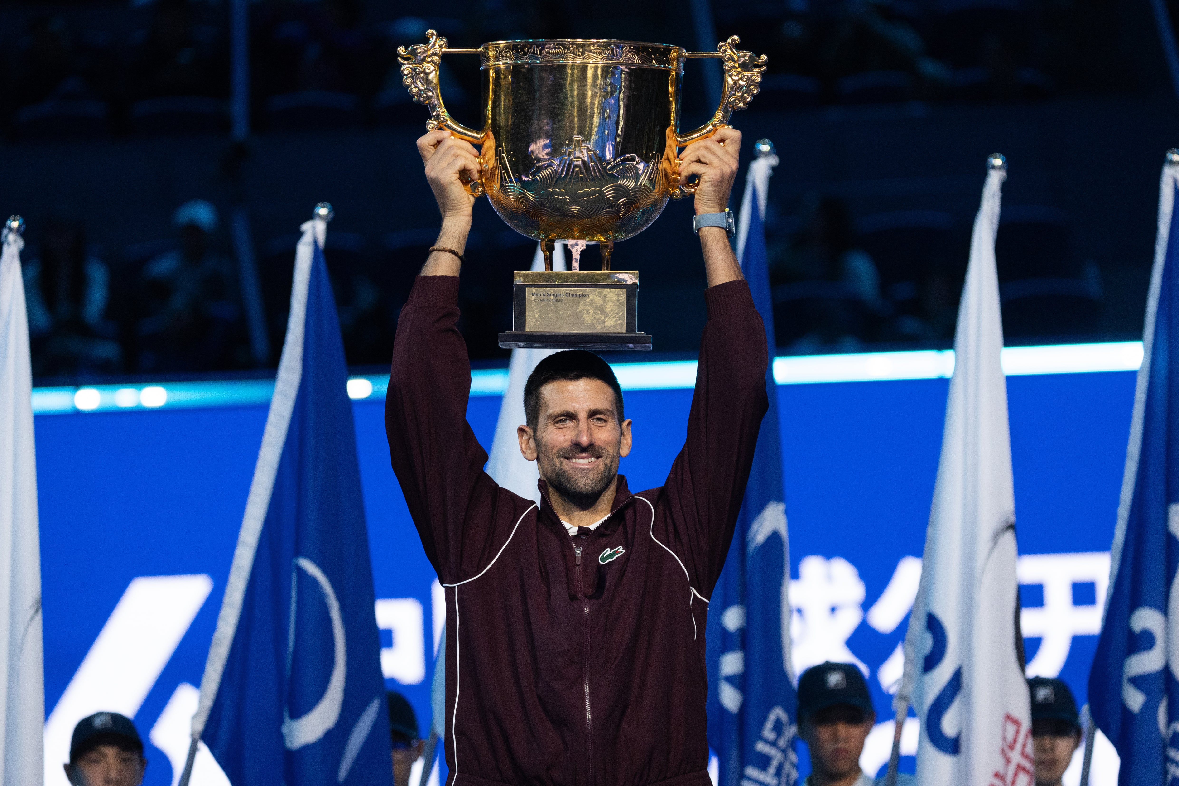 BEIJING (China), 06/10/2026.- Novak Djokovic of Serbia poses with his trophy after winning the men's final singles match against Alex De Minaur of Australia at the China Open tennis tournament in Beijing, China, 06 October 2026. (Tenis) EFE/EPA/JESSICA LEE