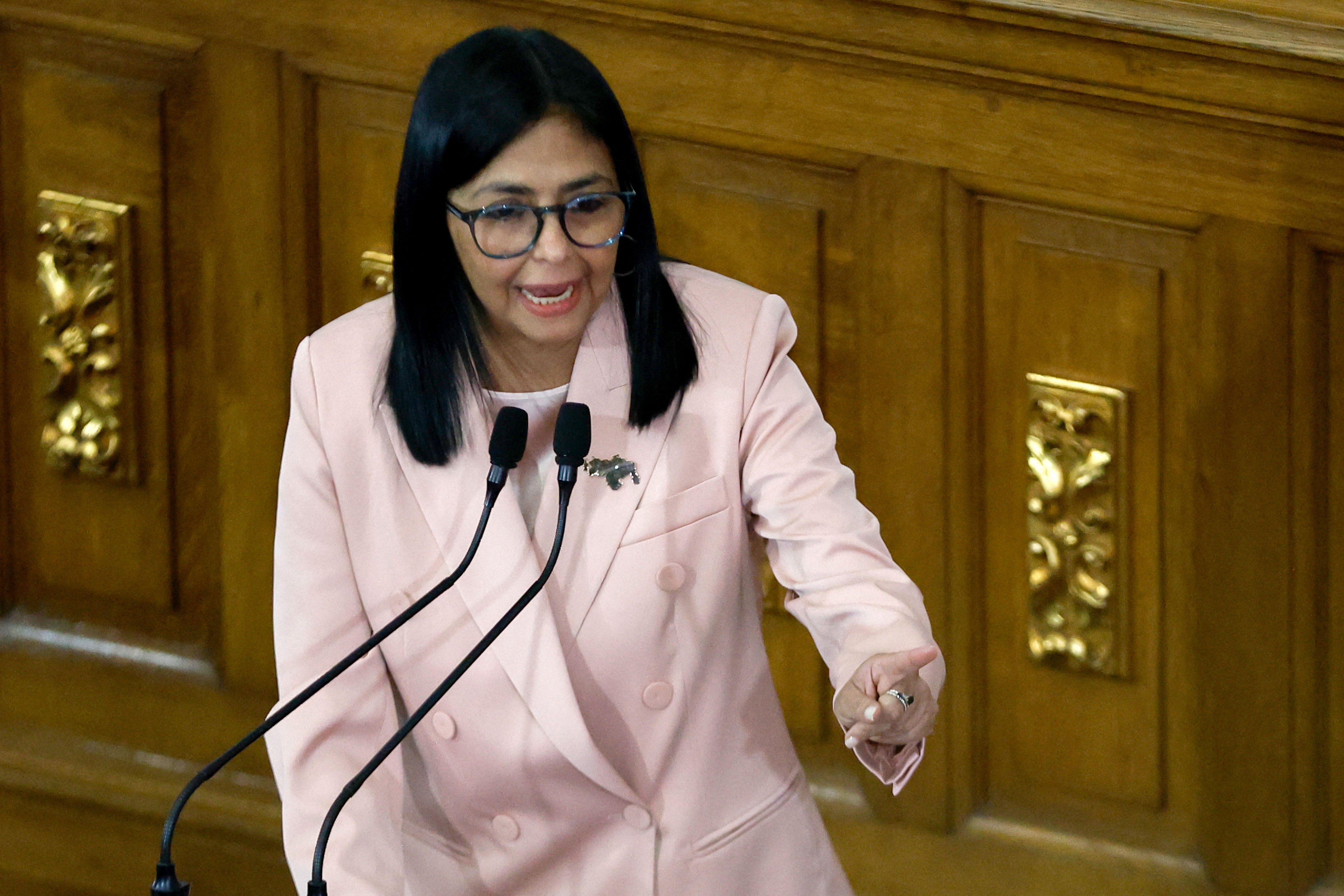 Venezuela's Vice President Delcy Rodriguez speaks during the presentation of the 2026 fiscal year budget at the National Congress in Caracas on December 4, 2025. The Venezuelan government presented its budget for 2026 on December 4, 2025, which, calculated in dollars, is 12% less than the budget approved for 2025, while denouncing "a Dantesque deployment" of US military forces in the Caribbean. (Photo by Pedro MATTEY / AFP)