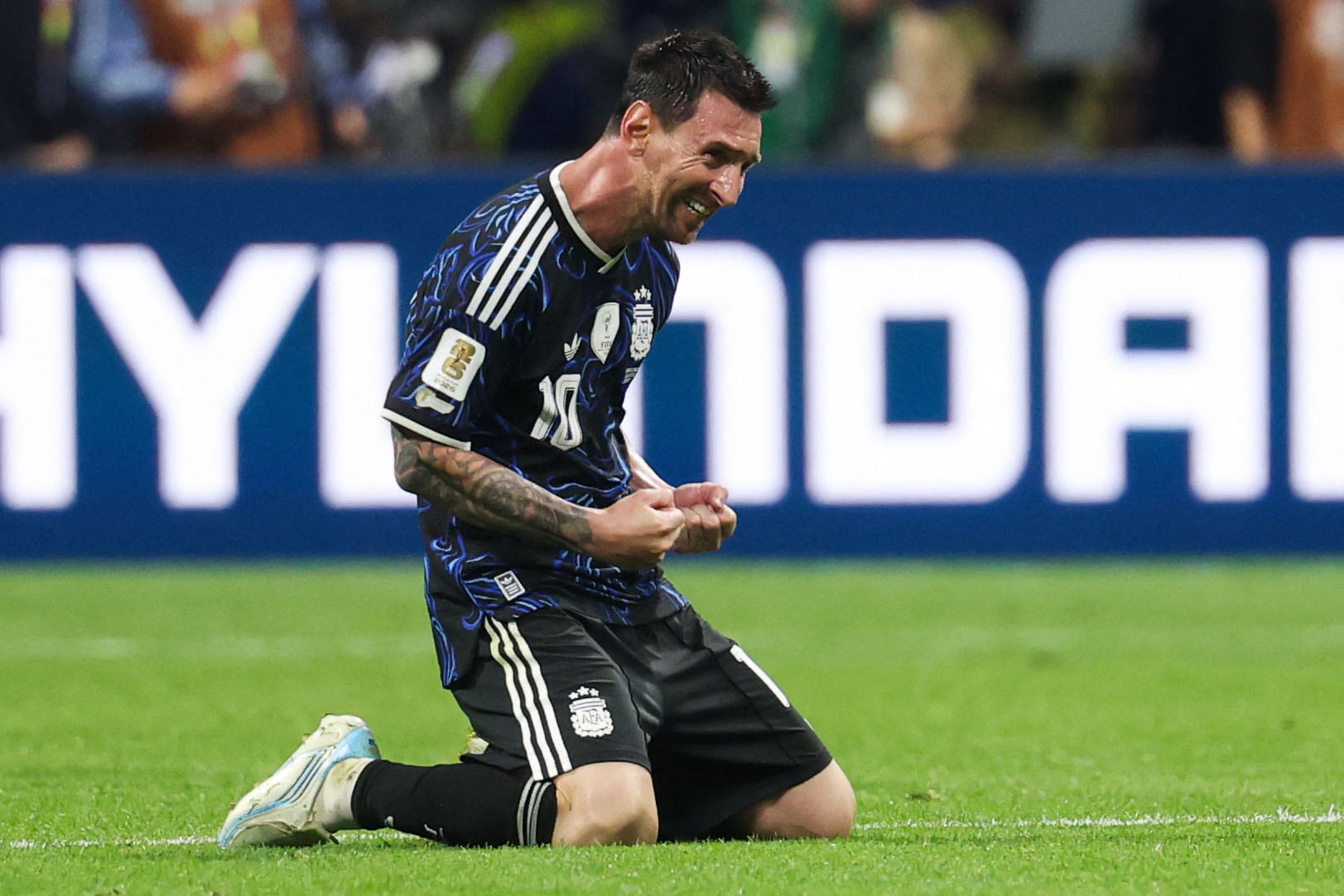 Argentina's forward #10 Lionel Messi celebrates after winning the 2026 World Cup football tournament semi-final match between England and Argentina at the Atlanta Stadium in Atlanta on July 15, 2026. (Photo by Odd ANDERSEN / AFP)
