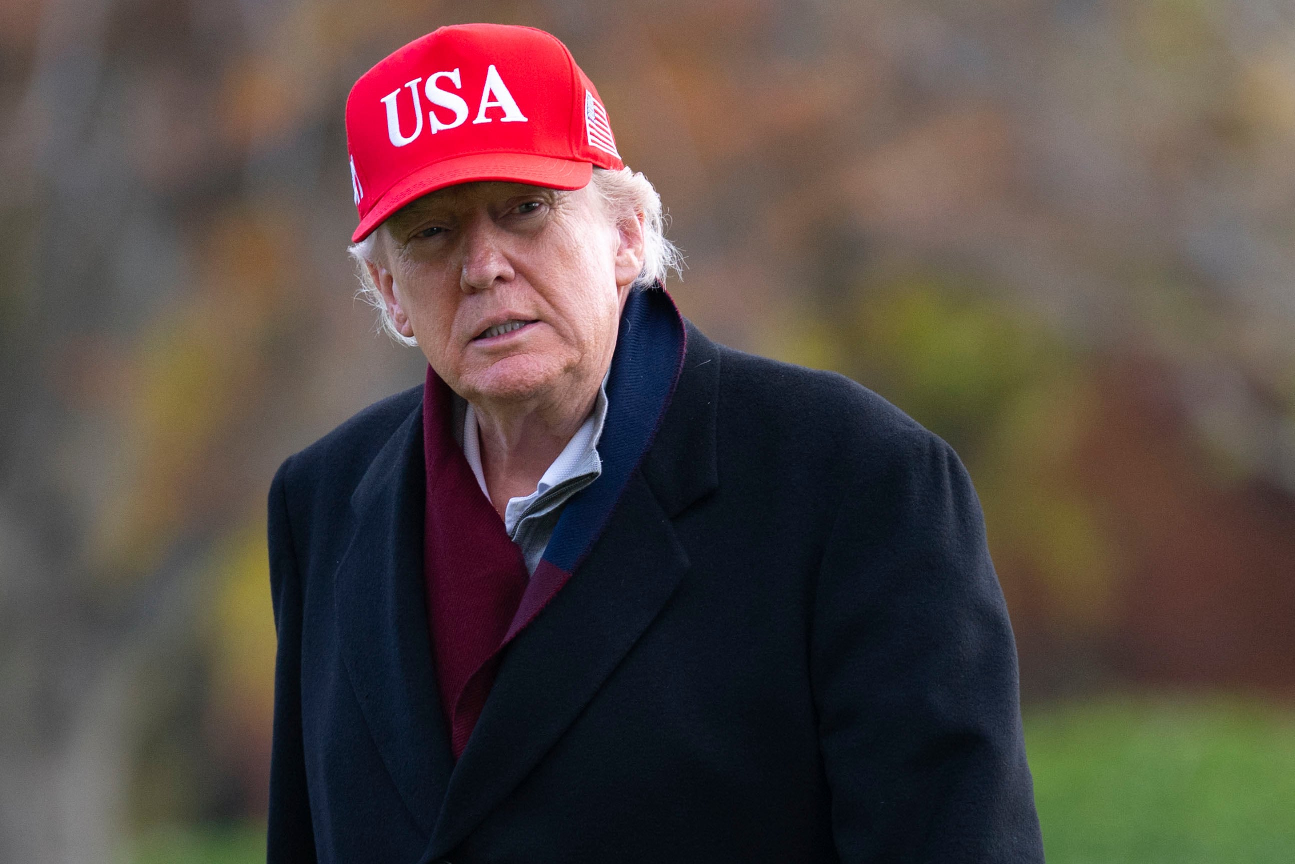 WASHINGTON, DC - NOVEMBER 22: U.S. President Donald Trump arrives on the South Lawn of the White House on November 22, 2025 in Washington, DC. Trump visited Joint Base Andrews in Prince Georges County Maryland to tour the golf course located on the base. John McDonnell/Getty Images/AFP (Photo by John McDonnell / GETTY IMAGES NORTH AMERICA / Getty Images via AFP)