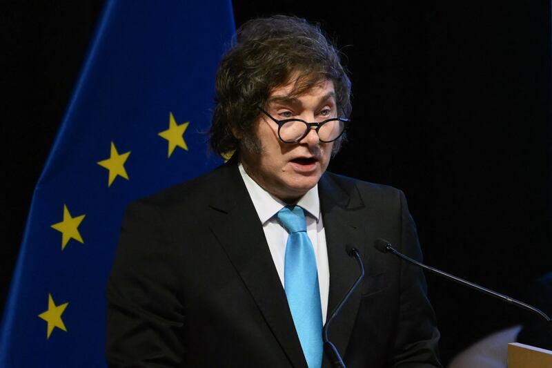 Argentina's President Javier Milei delivers a speech during the signing ceremony of the trade agreement between the European Union and Mercosur, at the Gran Teatro Jose Asuncion Flores of Paraguay's Central Bank in Asuncion on January 17, 2026. The South American bloc Mercosur and the European Union on January 17 signed a major trade deal that has been 25 years in the making. (Photo by Luis ROBAYO / AFP)