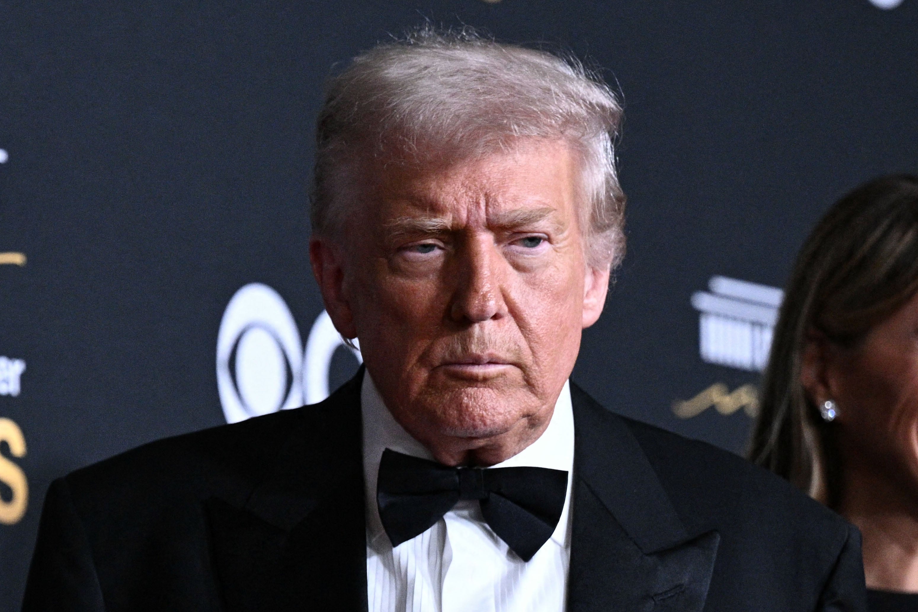 US President Donald Trump and First Lady Melania Trump arrive for the 48th Kennedy Center Honors gala at the Kennedy Center in Washington, DC, on December 7, 2025. (Photo by Brendan SMIALOWSKI / AFP)