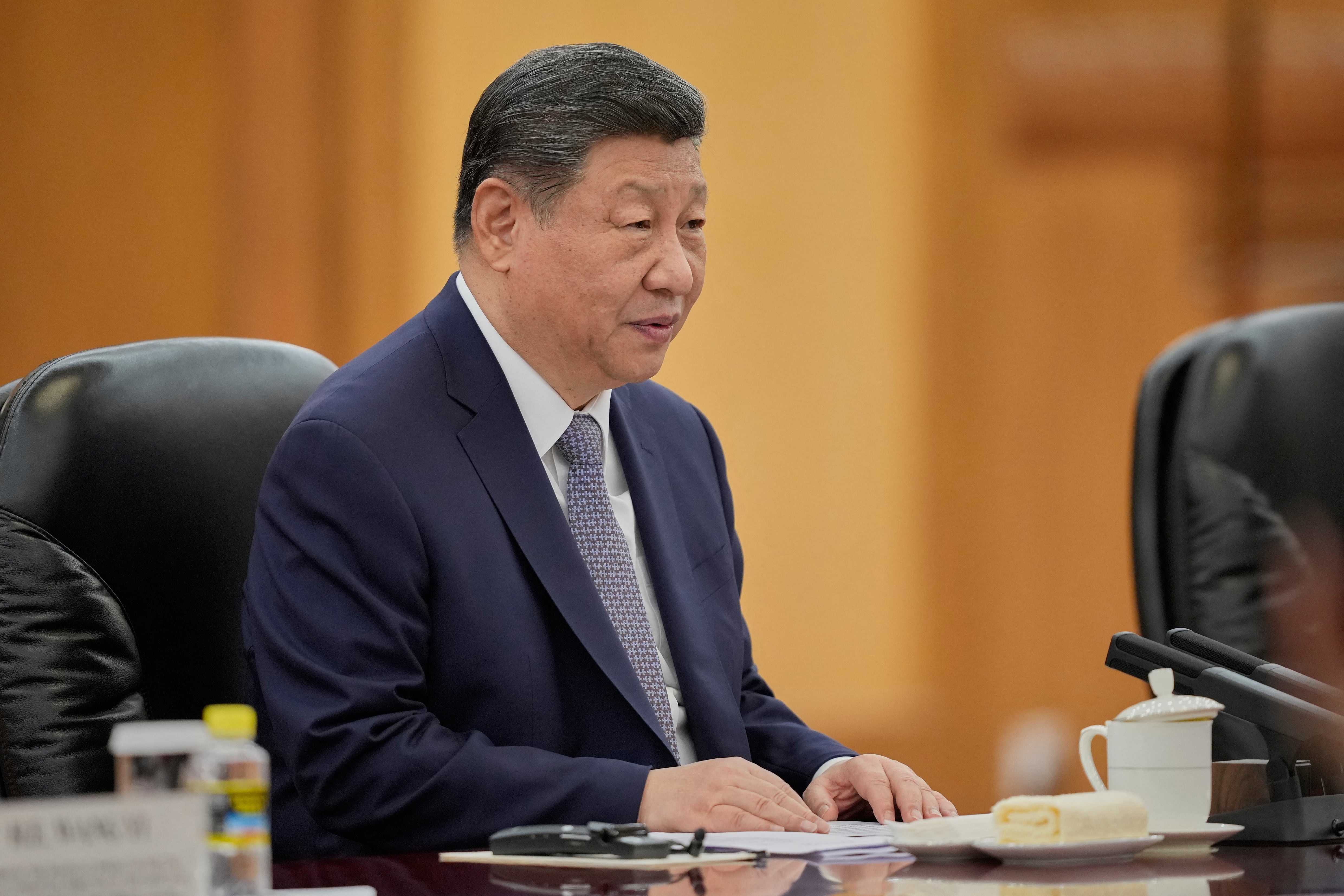 China's President Xi Jinping speaks during a meeting with Britain's Prime Minister Keir Starmer at the Great Hall of the People in Beijing on January 29, 2026. Starmer met with China's leader Xi Jinping in Beijing on January 29, state news agency Xinhua reported, with talks expected to cover trade ties, national security and human rights. (Photo by Vincent Thian / POOL / AFP)