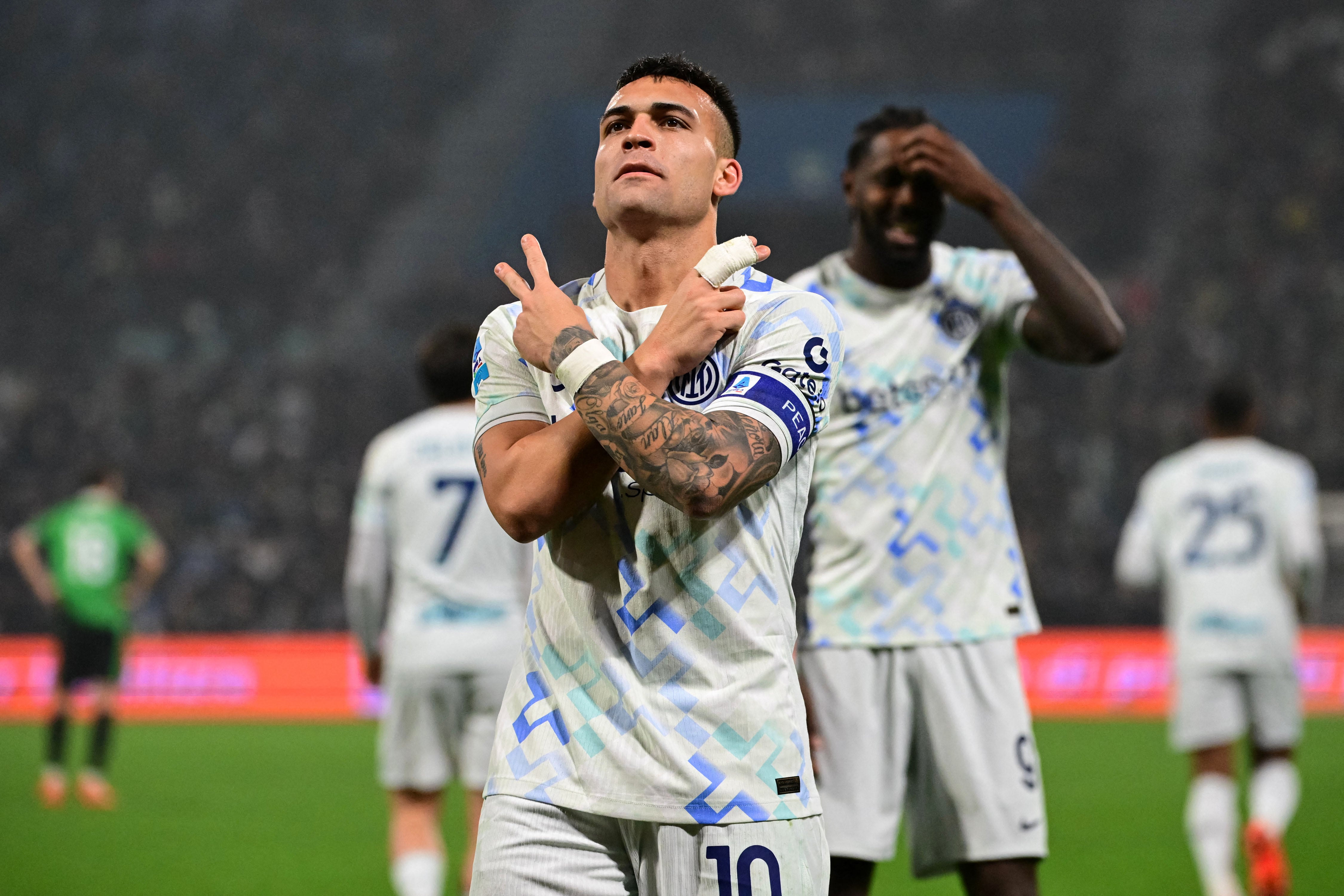 Inter Milan's Argentine forward #10 Lautaro Martinez celebrates after scoring his team's third goal during the Italian Serie A football match between Sassuolo and Inter Milan at the Mapei Stadium in Reggio Emilia, Italy on February 8, 2026 (Photo by Piero CRUCIATTI / AFP)