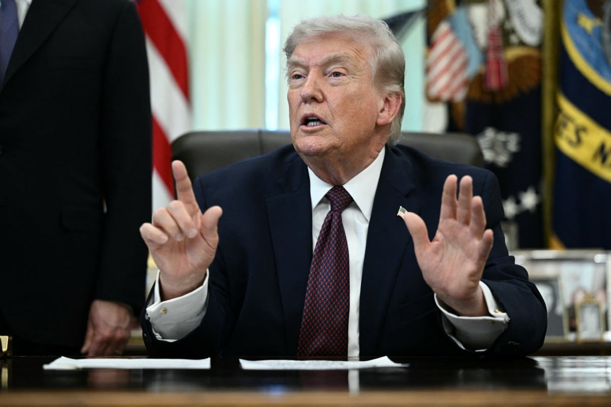 US President Donald Trump speaks after signing an executive order in the Oval Office of the White House in Washington, DC, on March 31