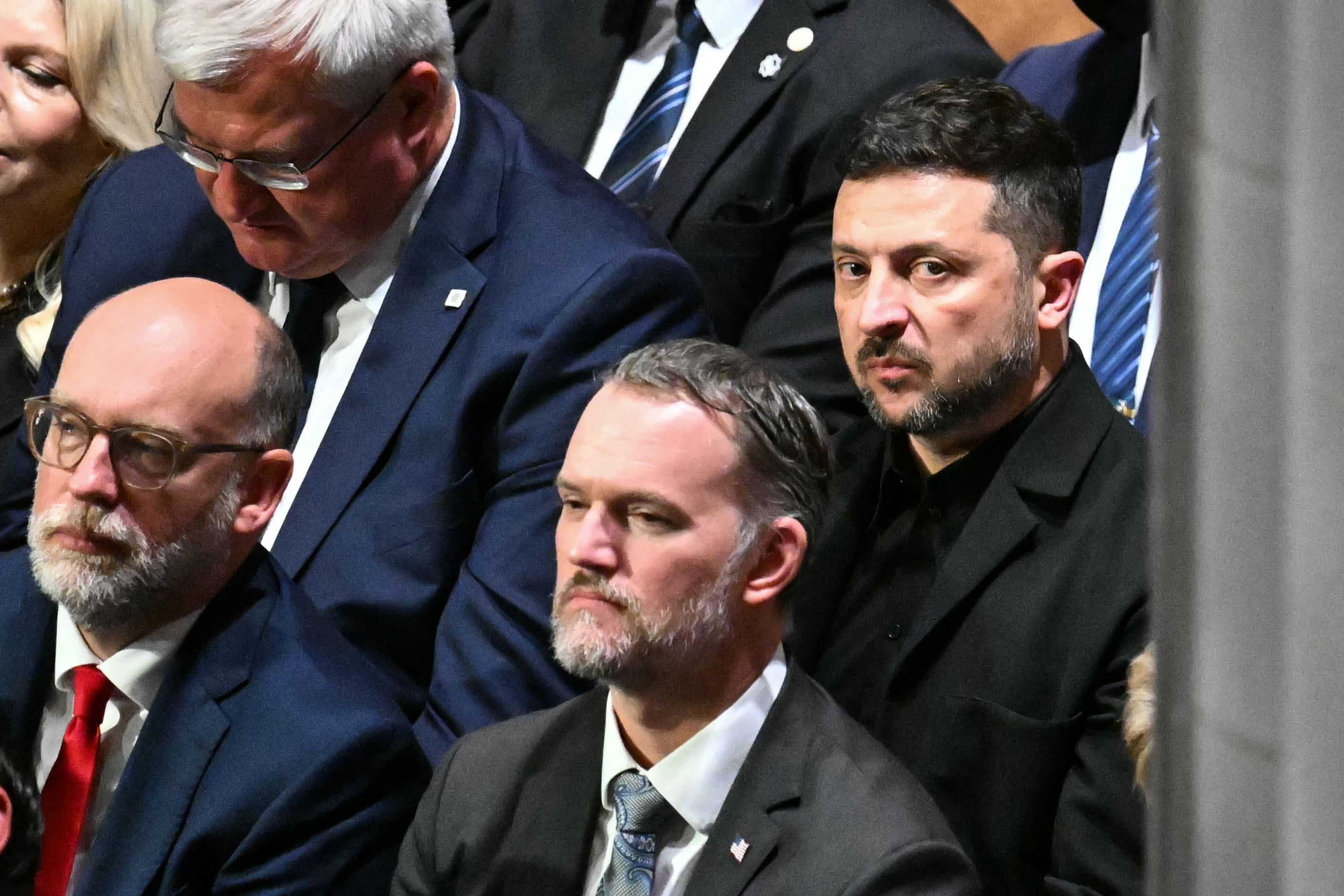 Ukrainian President Volodymyr Zelensky attends the funeral service for US Senator Lindsey Graham at the Washington National Cathedral in Washington, DC, on July 28, 2026. Graham, a South Carolina Republican and key Trump ally who was elected to the Senate four times, died at age 71 on July 11. (Photo by Alex WROBLEWSKI / AFP)