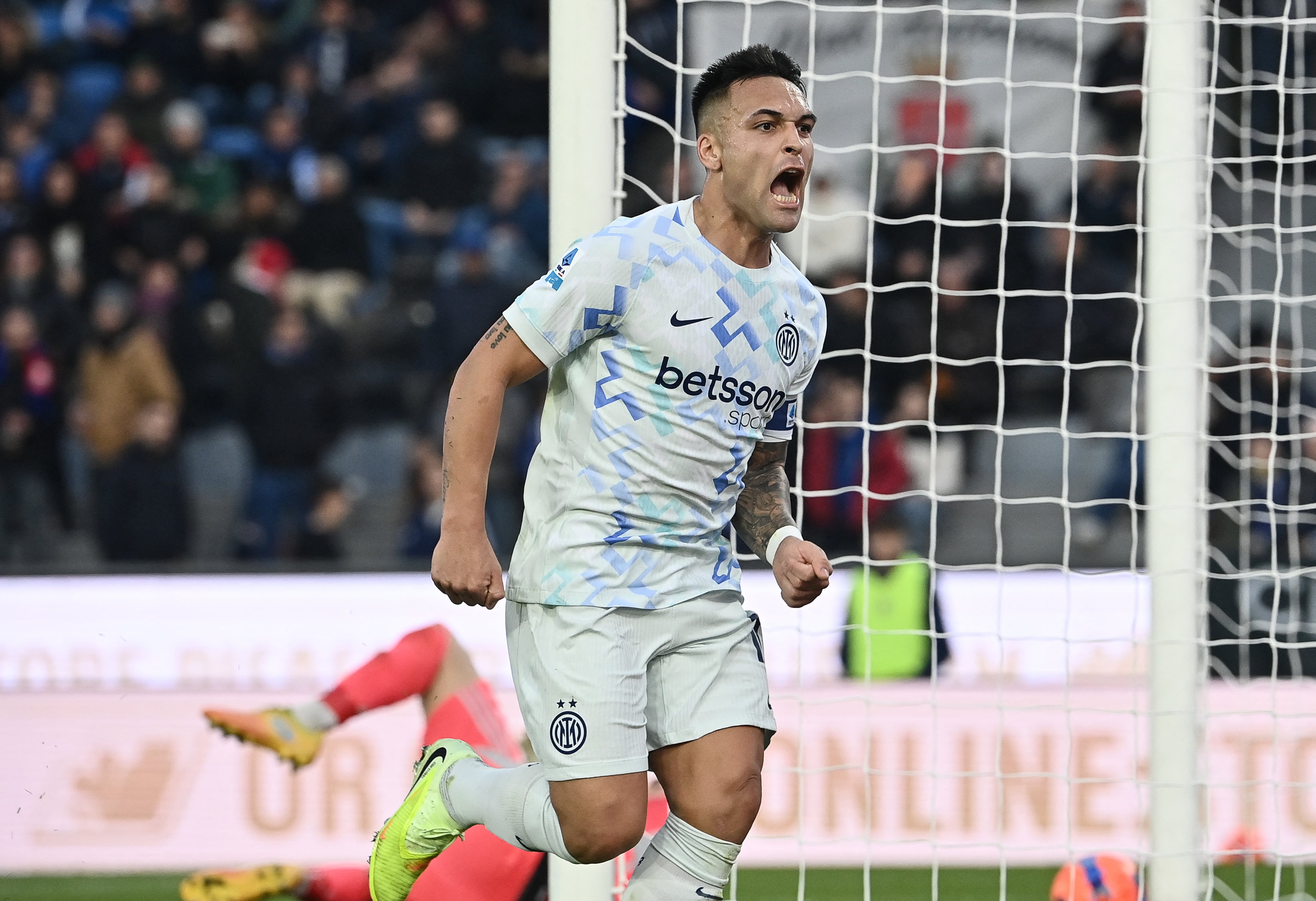 Inter Milan's Argentine forward #10 Lautaro Martinez celebrates after scoring his team's first goal during the Italian Serie A football match between Pisa and Inter Milano at Arena Garibaldi Romeo Anconetani stadium in Pisa, on November 30, 2025. (Photo by Isabella BONOTTO / AFP)