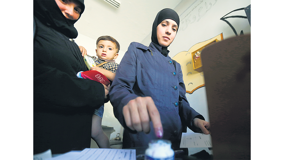 Los domingos son laborables en Siria, lo que en teoría lleva a una baja participación electoral.