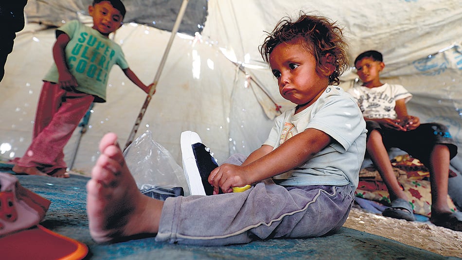 Niños sirios desplazados de sus hogares en Deir Ezzor y asistidos por Unicef.