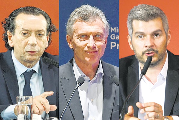 Dante Sica, Mauricio Macri y Marcos Peña firmaron el decreto.