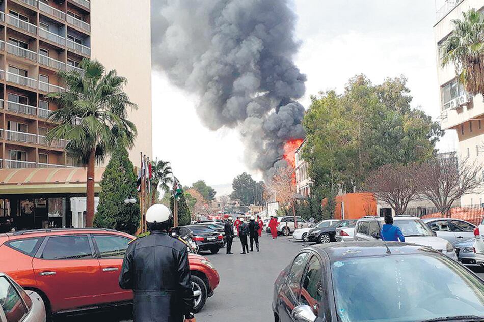 Mientras Israel bombardeaba Homs los combates continuaban en Ghouta, un suburbio de Damasco.