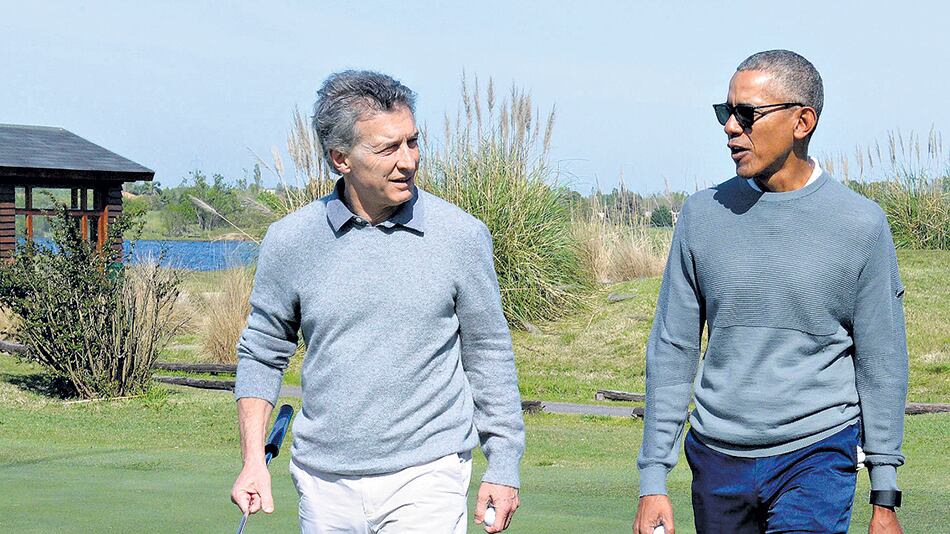 Macri y Obama ayer en la cancha del Golf Club Buenos Aires.