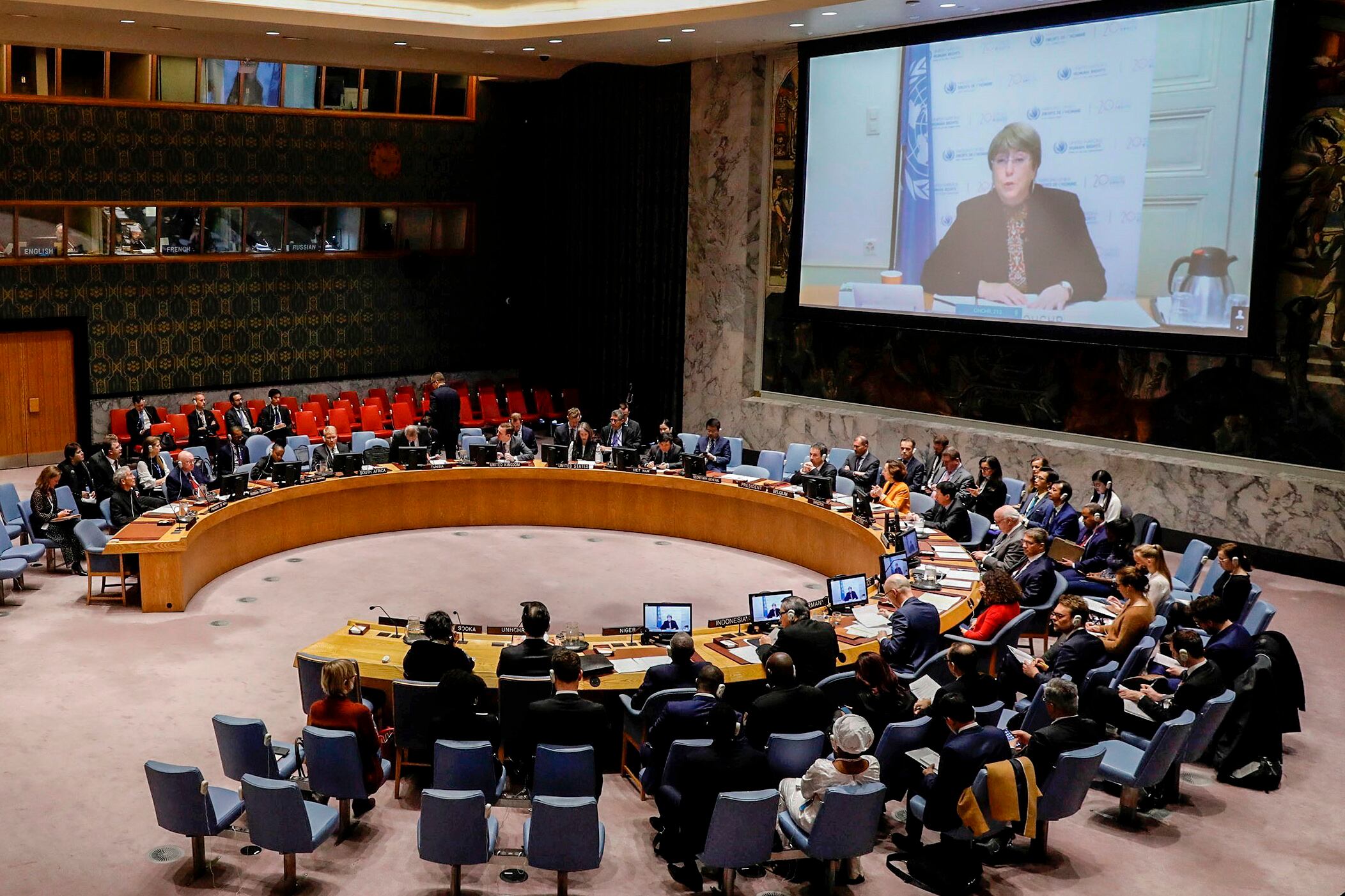 Bachelet anncia la lista de empresas sancionadas al consejo de Seguridad de la ONU reunido en Nueva York.