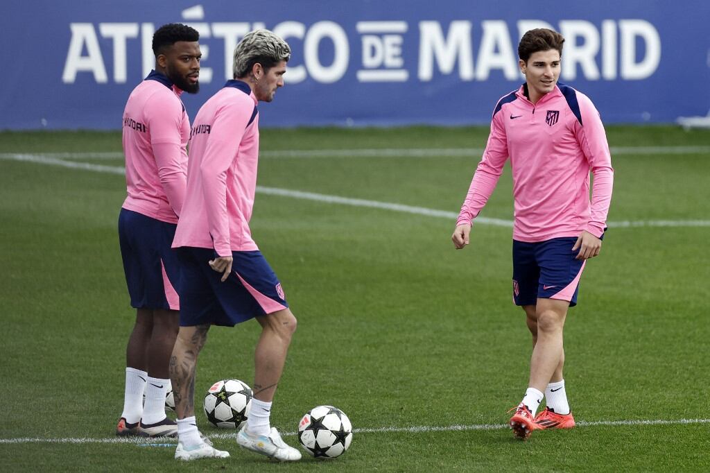 De Paul, Julián y el francés Lemar en la práctica del Atlético.