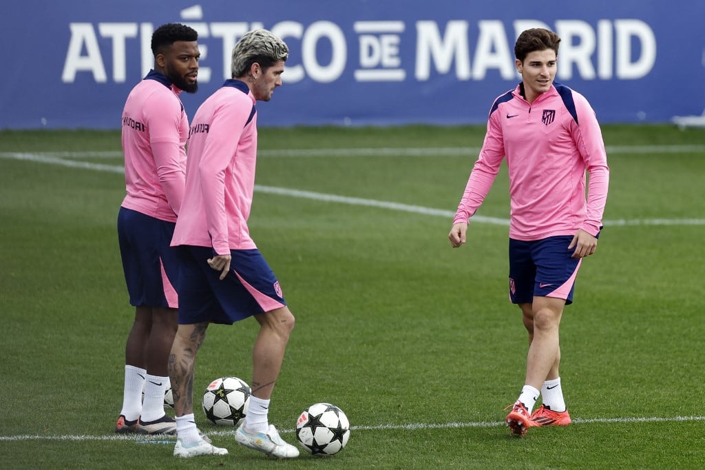 De Paul, Julián y el francés Lemar en la práctica del Atlético.