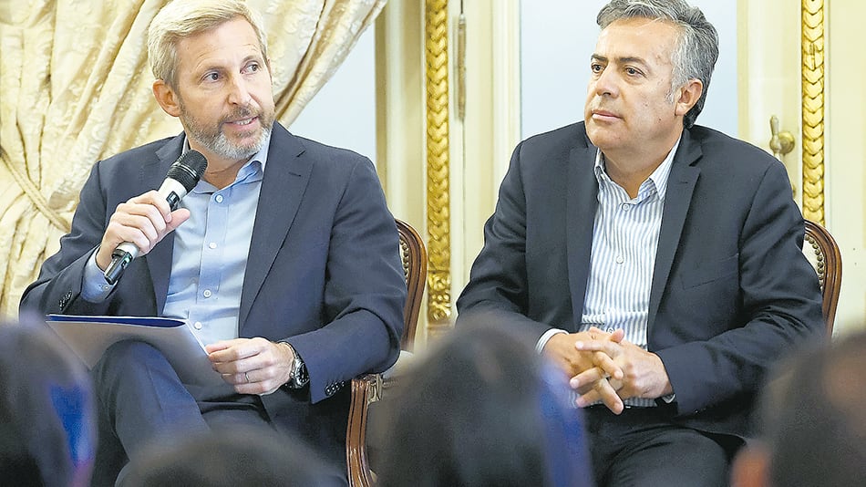 Rogelio Frigerio y Alfredo Cornejo, dos de los participantes de la cena.