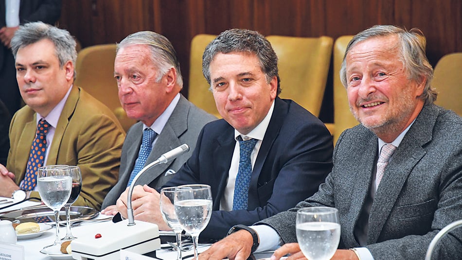 Nicolás Dujovne junto a Cristiano Rattazzi y Daniel Funes de Rioja.