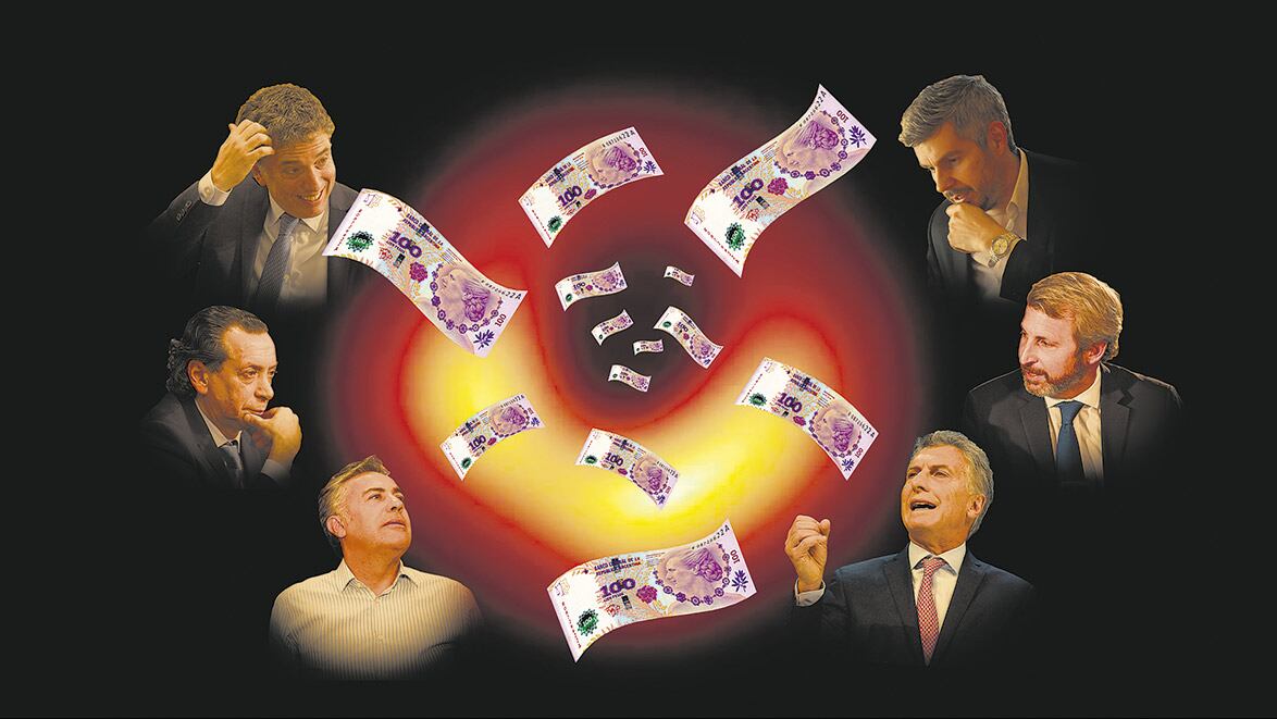 A la izquierda, Nicolás Dujovne, Dante Sica y Alfredo Cornejo. A la derecha, Marcos Peña, Rogelio Frigerio y Mauricio Macri.