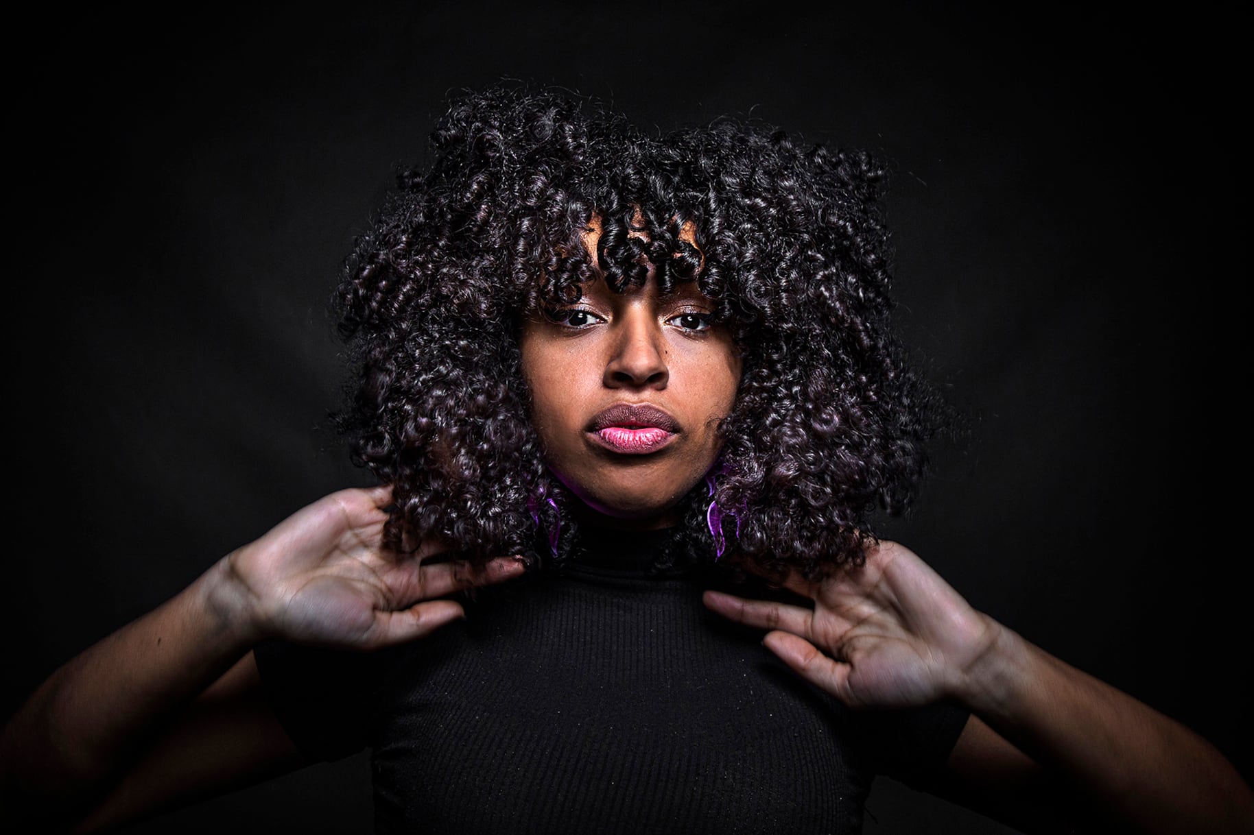 Louis Yupanqui, militante trans y afro y especialista en rizos y rulos.