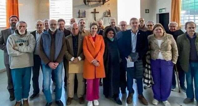 Diputados libertarios con genocidas, en Ezeiza