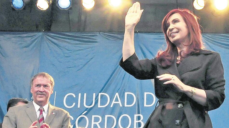 Juan Schiaretti y Cristina Kirchner, con señales de distensión.