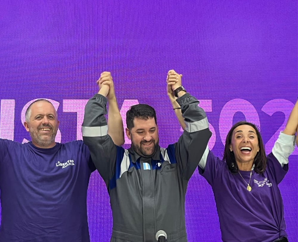 González (centro) y Andreussi