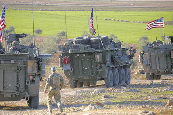 Un convoy de vehículos armados estadounidenses pasaba por el poblado de Yalanli, Siria, en marzo de 2017.