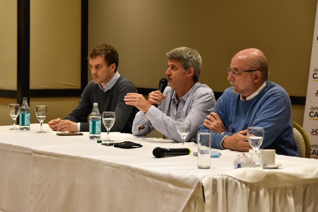 Flavio Fama, Prat Gay y Monti, de derecha a izquierda.