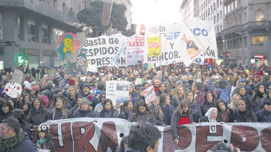 “En Pepsico reincorporación ya”, decía la bandera que encabezó la movilización.