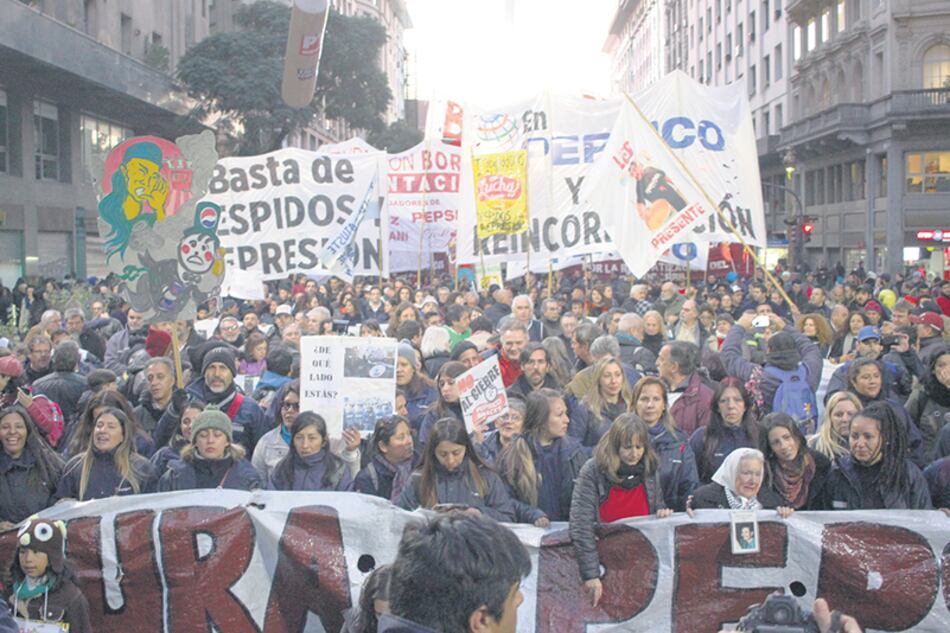 “En Pepsico reincorporación ya”, decía la bandera que encabezó la movilización.