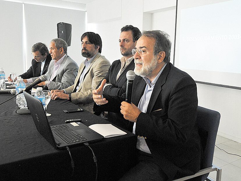 Arnaldo Bocco, José Urtubey y Nicolás Trotta durante la presentación del informe.