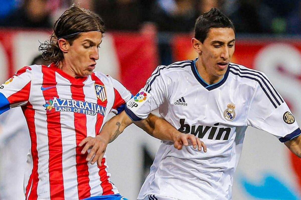 Filipe Luis y Di María en un partido entre Atlético de Madrid y Real Madrid.