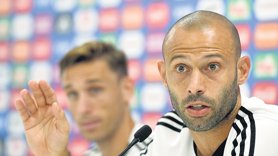 Mascherano y Biglia.