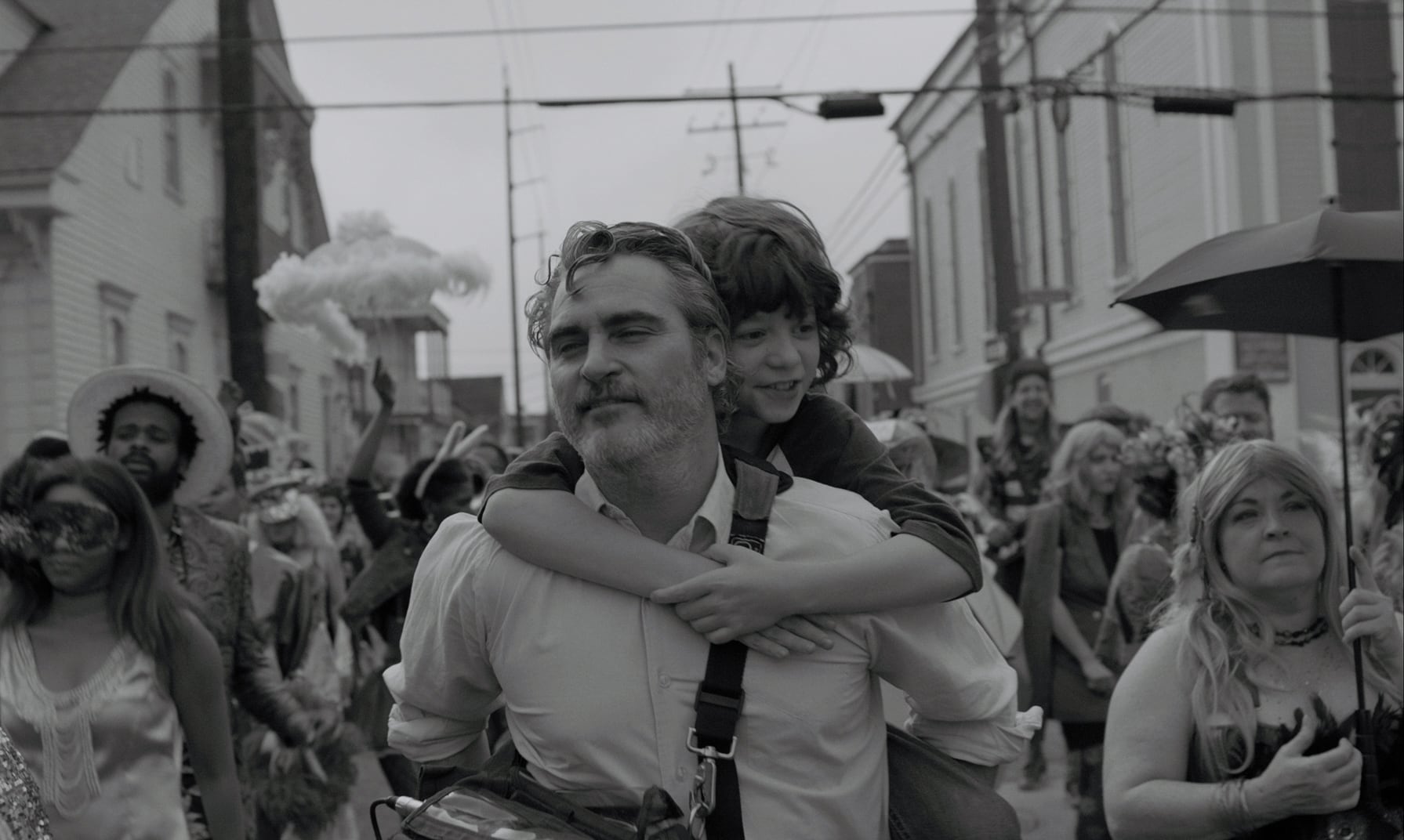 Joaquin Phoenix y Woody Norman