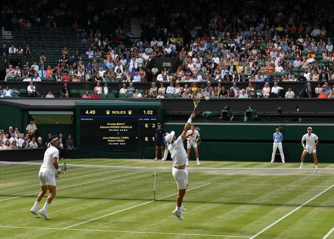 Partido de dobles en Wimbledon.
