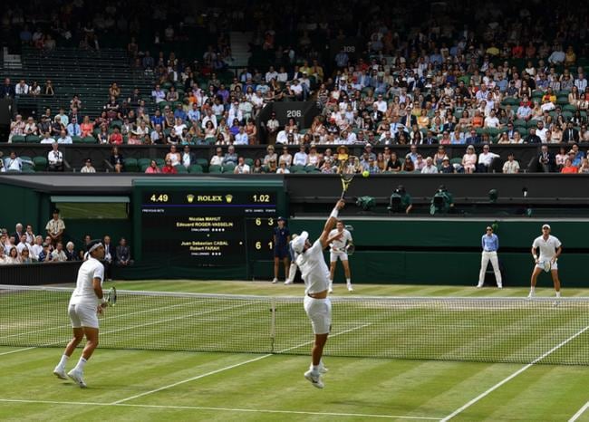 Partido de dobles en Wimbledon.