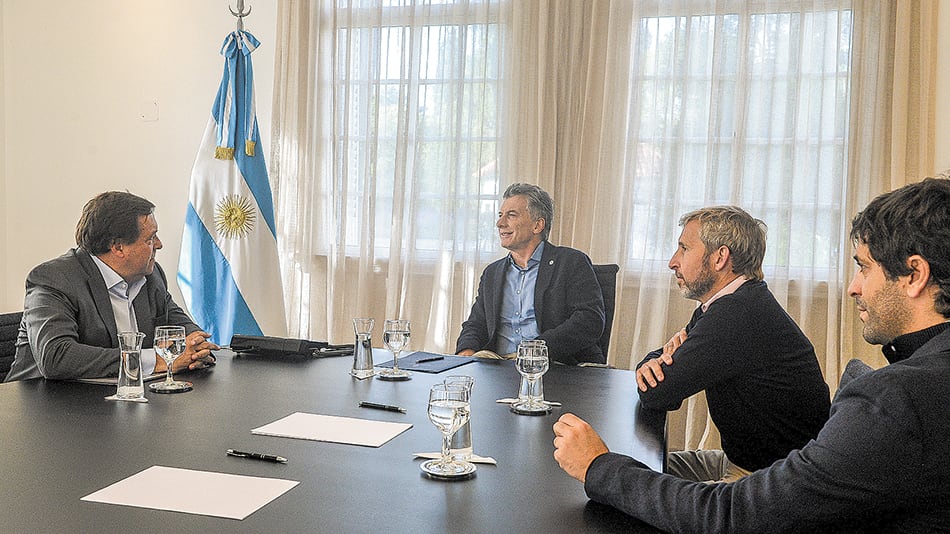 Weretilneck, Macri, Frigerio y García De Luca, ayer, durante la visita del patagónico a la quinta presidencial.
