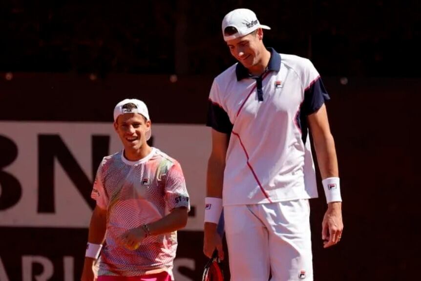 El Peque Schwartzman y el gigante Isner, en dupla este domingo en Roma.