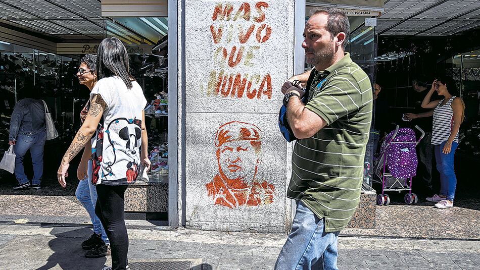 La imagen de Chávez, presente en las calles de Caracas a horas de la gran marcha.