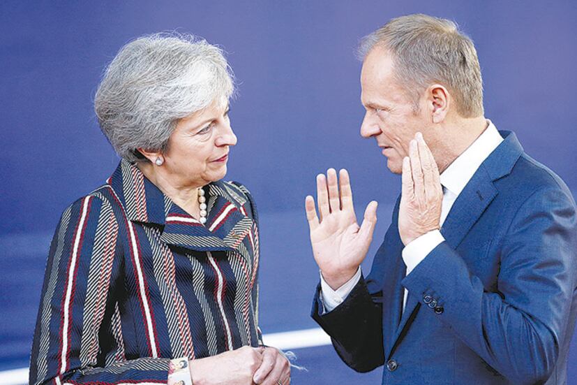 May y Tusk durante un encuentro en Bruselas, en octubre del año pasado.