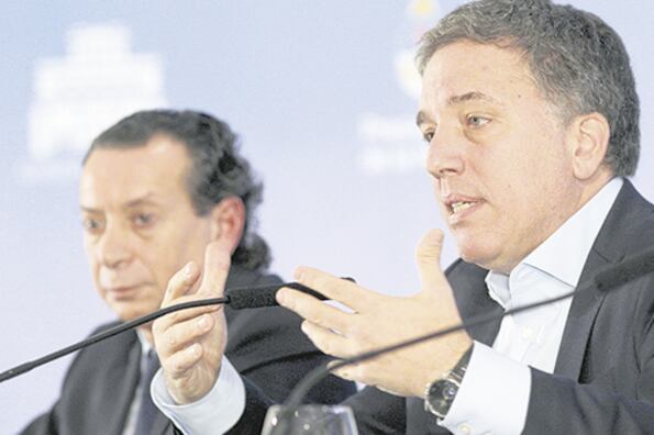 Dante Sica y Nicolás Dujovne. Convocatoria a los fabricantes para tratar de bajar tensiones.