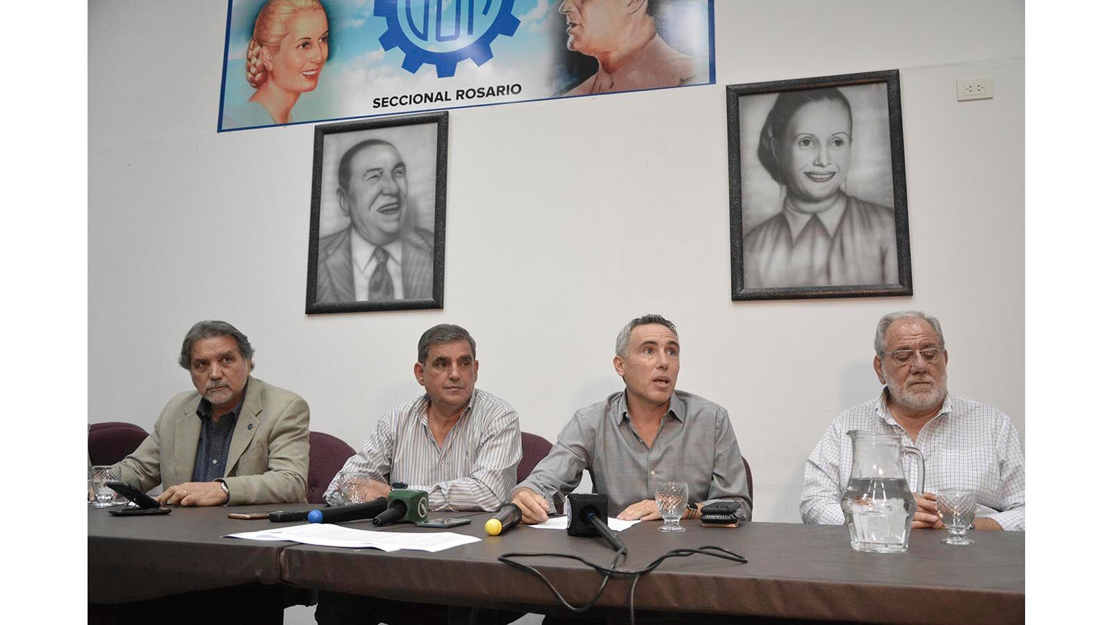 Lenci, Donello, Cerra y Conde en la sede de la UOM.