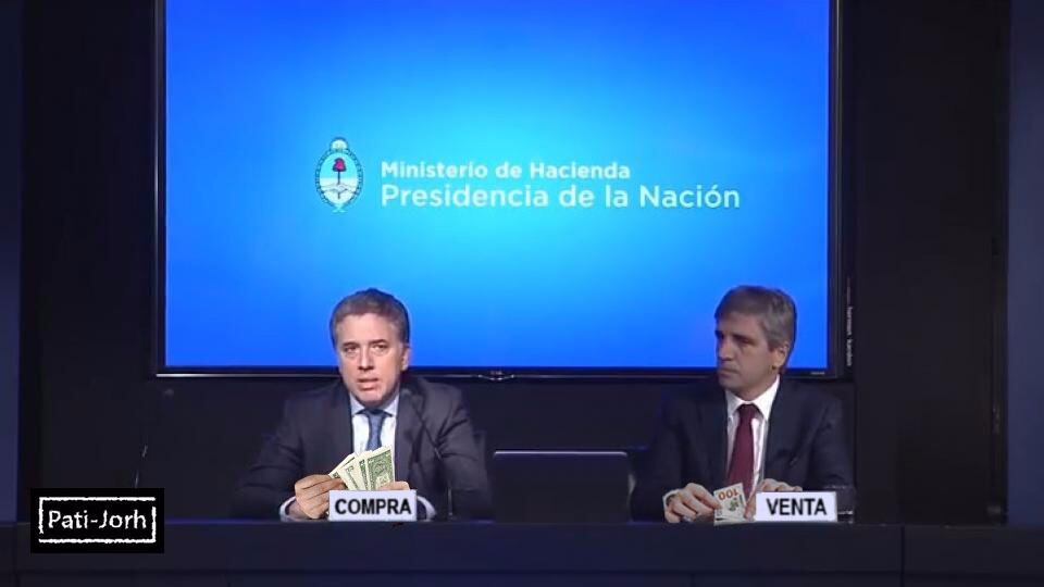 Dujovne junto a Caputo, al anunciar ayer las medidas para parar la escalada del dólar.