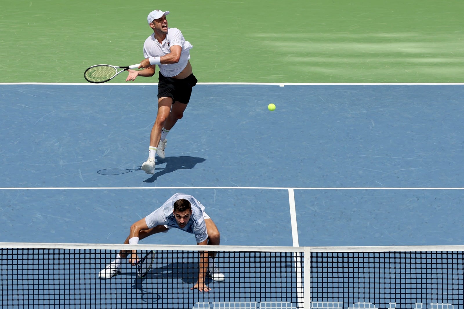 Zeballos, en el fondo, junto a Granollers en Cincinnati.