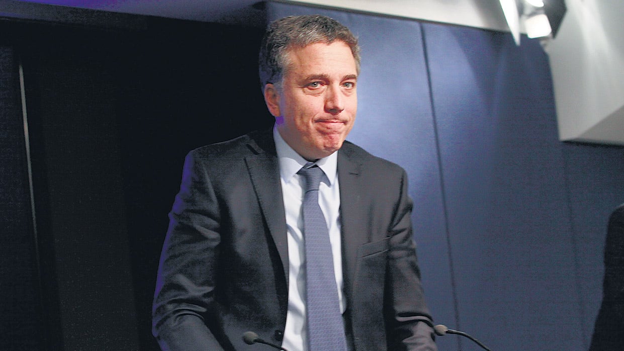 Dos años después de este cartel, Dujovne lidera el regreso al Fondo.