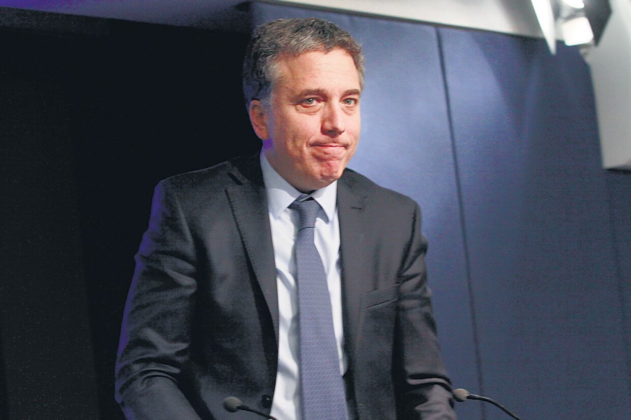 Dos años después de este cartel, Dujovne lidera el regreso al Fondo.