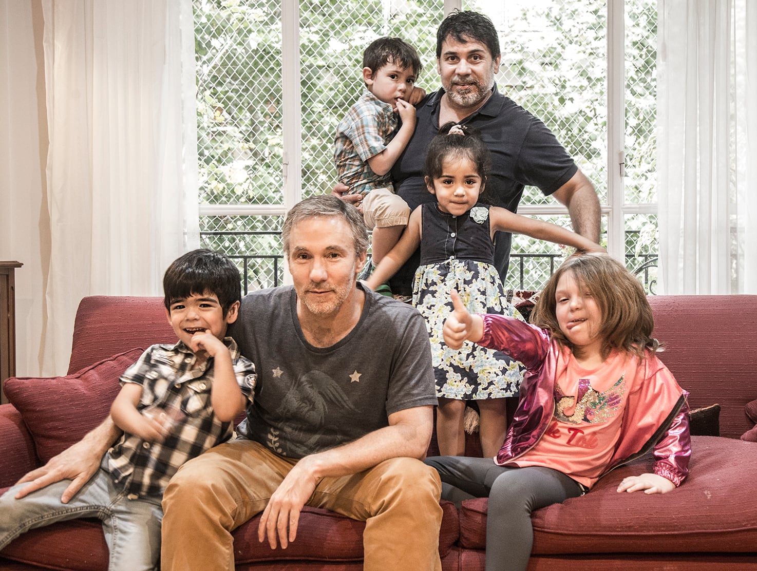 Carlos, Horacio y sus hijes