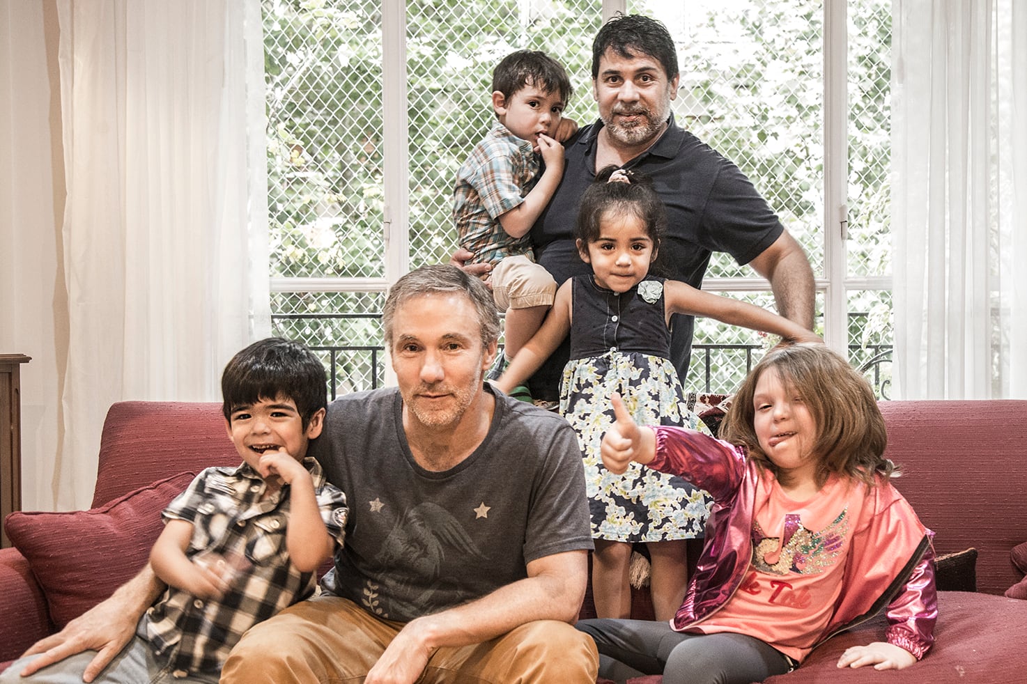 Carlos, Horacio y sus hijes